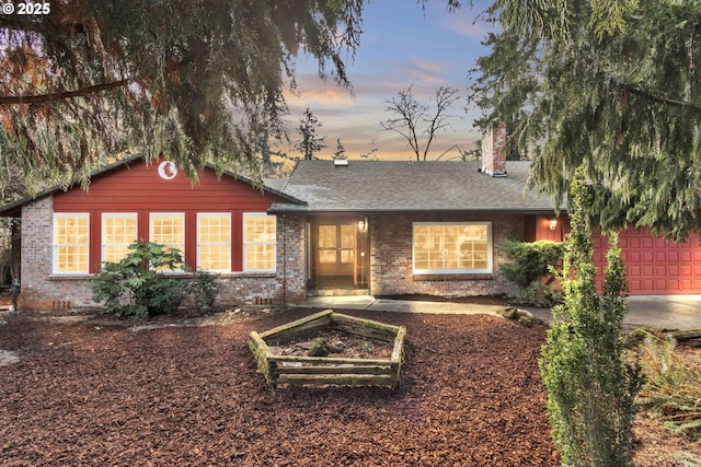 ranch-style home with a garage