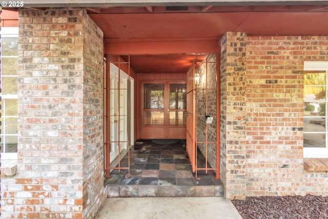 entrance to property featuring french doors