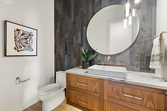 14410 Uplands Dr, Lake Oswego, OR 97034 - bathroom featuring vanity, toilet, and baseboards