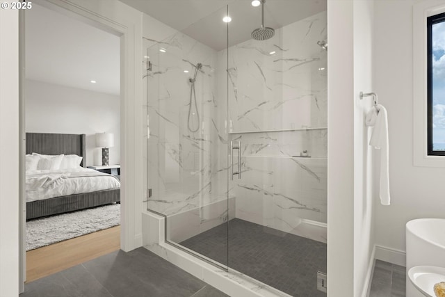 14410 Uplands Dr, Lake Oswego, OR 97034 - ensuite bathroom featuring a marble finish shower, recessed lighting, baseboards, and a freestanding bath