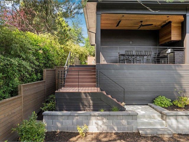 14410 Uplands Dr, Lake Oswego, OR 97034 - view of side of home with stairs and a ceiling fan