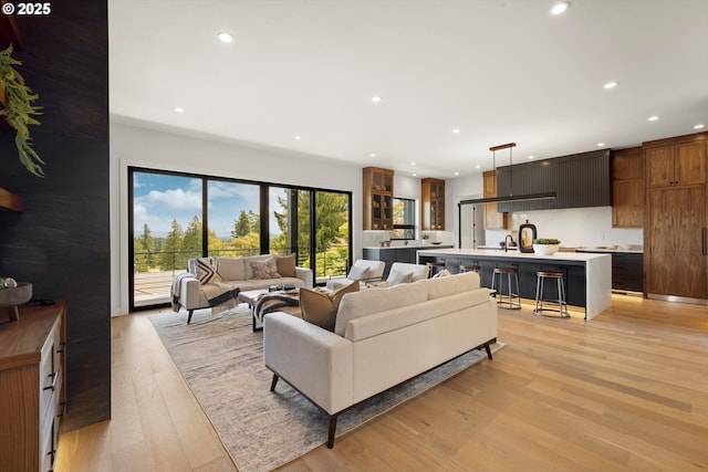 14410 Uplands Dr, Lake Oswego, OR 97034 - living room featuring light wood-style floors and recessed lighting