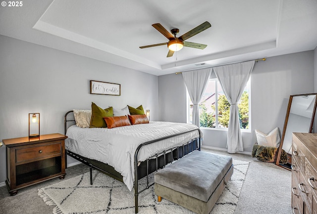 417 W Kemper Crest Dr, Newberg, OR 97132 - bedroom featuring a tray ceiling, carpet floors, baseboards, and ceiling fan