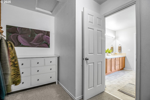 417 W Kemper Crest Dr, Newberg, OR 97132 - corridor featuring attic access, a sink, and baseboards