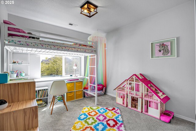 playroom featuring baseboards, visible vents, and carpet