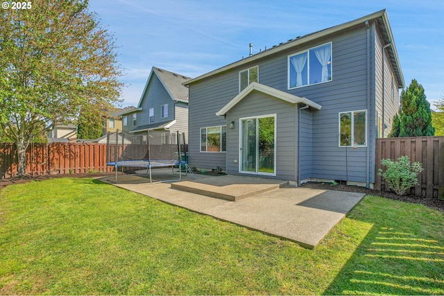 417 W Kemper Crest Dr, Newberg, OR 97132 - back of house with a trampoline and a patio