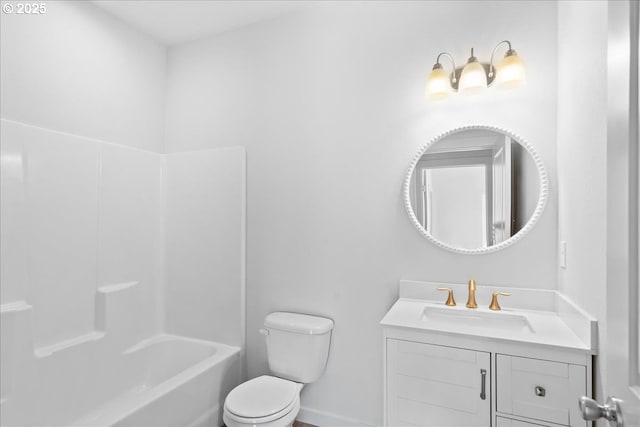 full bath featuring baseboards, toilet, vanity, and shower / bathing tub combination