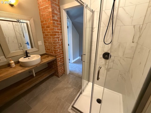 351 Juniper St, Junction City, OR 97448 - bathroom featuring tile patterned floors, vanity, and a shower stall