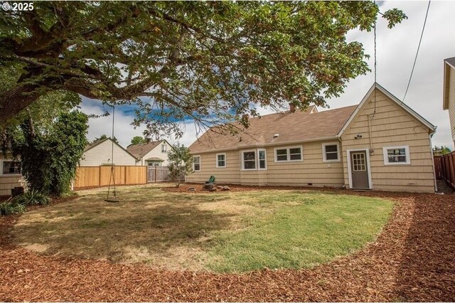 351 Juniper St, Junction City, OR 97448 - rear view of house with a lawn and a fenced backyard