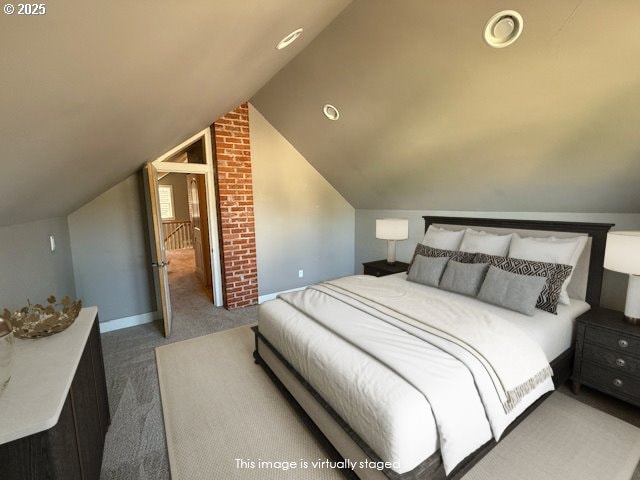 351 Juniper St, Junction City, OR 97448 - carpeted bedroom featuring lofted ceiling and baseboards