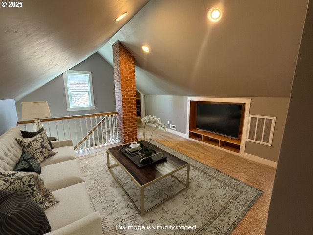 351 Juniper St, Junction City, OR 97448 - living room with lofted ceiling, carpet flooring, baseboards, and visible vents