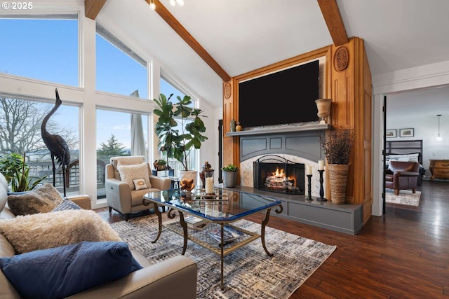 8014 SE Middle Way, Vancouver, WA 98664 - living room featuring a warm lit fireplace, beamed ceiling, high vaulted ceiling, and wood-type flooring