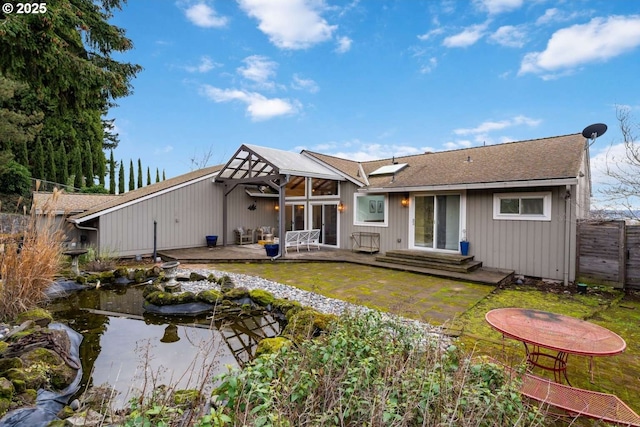 8014 SE Middle Way, Vancouver, WA 98664 - back of property with a garden pond and a patio area