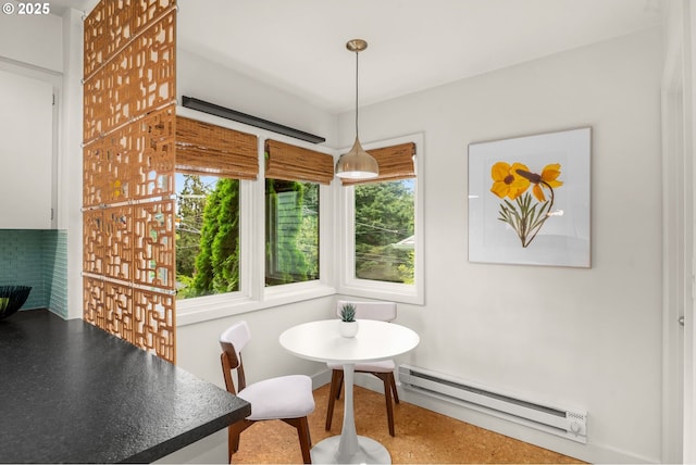 6945 SW 7th Ave, Portland, OR 97219 - dining area with baseboard heating and baseboards