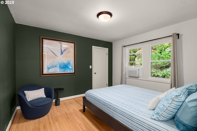 6945 SW 7th Ave, Portland, OR 97219 - bedroom featuring wood finished floors and baseboards