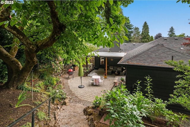 6945 SW 7th Ave, Portland, OR 97219 - rear view of property with roof with shingles and a patio area