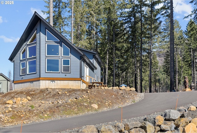 view of side of home featuring crawl space