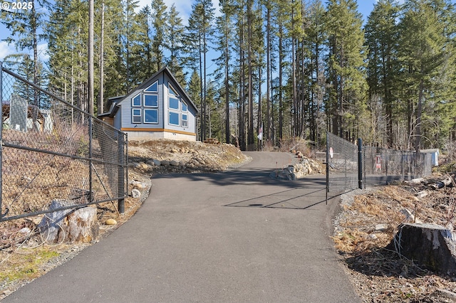 view of road with driveway