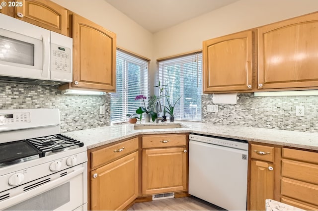 16371 SW Horseshoe Way, Beaverton, OR 97007 - kitchen with white appliances, a sink, light wood-style flooring, and light stone countertops