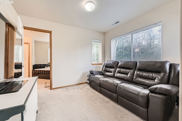 16371 SW Horseshoe Way, Beaverton, OR 97007 - living room featuring light colored carpet and baseboards