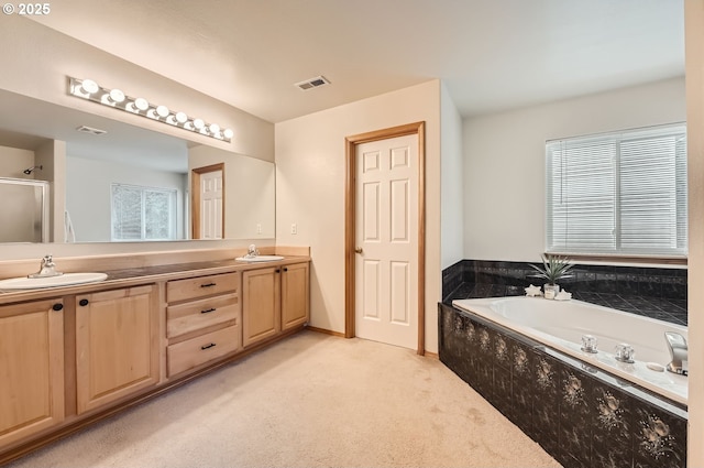 16371 SW Horseshoe Way, Beaverton, OR 97007 - bathroom with double vanity, a bath, and an enclosed shower