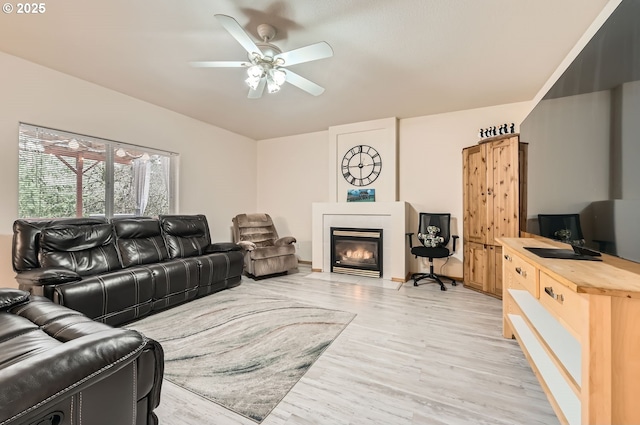 16371 SW Horseshoe Way, Beaverton, OR 97007 - living area featuring a fireplace with flush hearth, light wood-type flooring, and ceiling fan