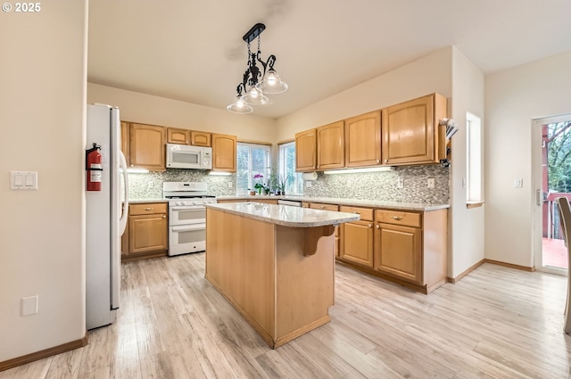 16371 SW Horseshoe Way, Beaverton, OR 97007 - kitchen featuring white appliances, backsplash, a center island, and light wood-style floors
