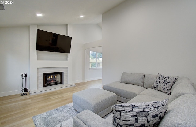 1611 NE 113th St, Vancouver, WA 98686 - living room with recessed lighting, light wood-type flooring, a lit fireplace, and vaulted ceiling