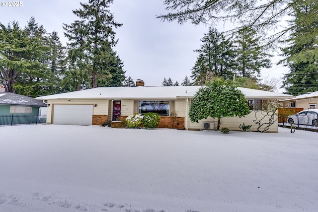 single story home featuring a garage