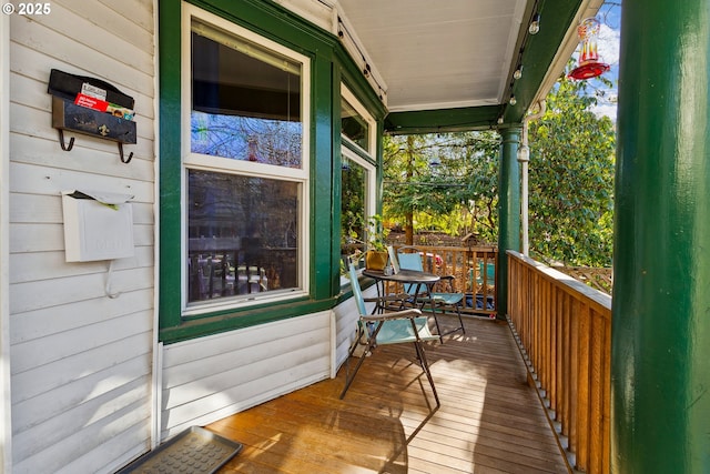 balcony featuring a porch