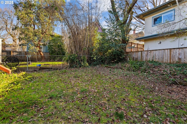 view of yard featuring a fenced backyard