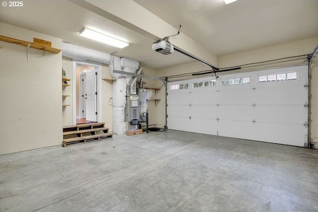 garage featuring a garage door opener and gas water heater