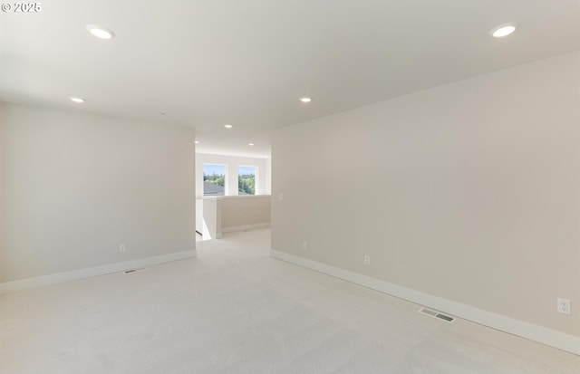 17437 NW Antonio St, Portland, OR 97229 - spare room featuring recessed lighting, baseboards, and light carpet