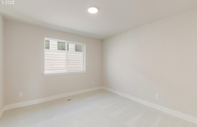 17437 NW Antonio St, Portland, OR 97229 - empty room featuring light colored carpet and baseboards