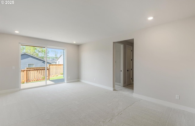 17437 NW Antonio St, Portland, OR 97229 - spare room featuring light colored carpet, recessed lighting, and baseboards