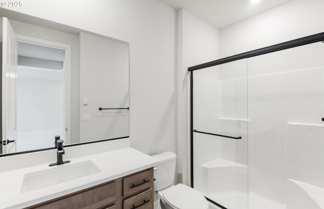 17437 NW Antonio St, Portland, OR 97229 - bathroom featuring a shower with shower door, vanity, and toilet