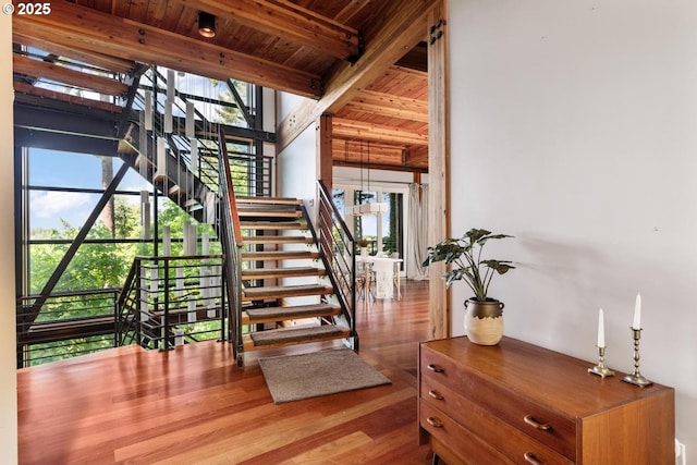4183 SW Greenleaf Dr, Portland, OR 97221 - stairs with wooden ceiling with exposed beams and wood finished floors