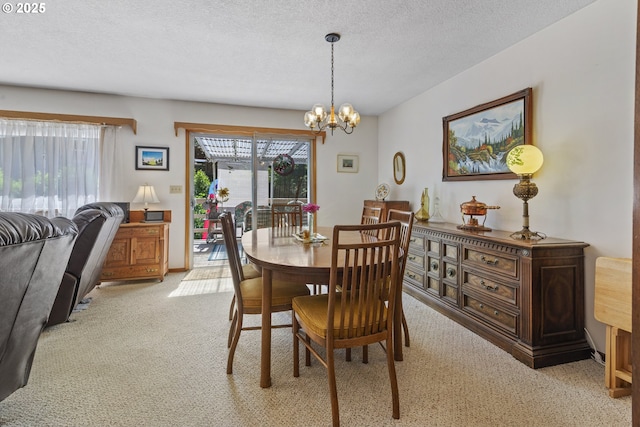 16828 Webster Rd, Gladstone, OR 97027 - dining area featuring light colored carpet, a chandelier, and a textured ceiling