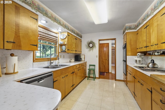 16828 Webster Rd, Gladstone, OR 97027 - kitchen with stainless steel appliances, light countertops, and backsplash