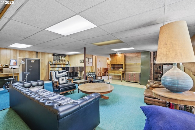 16828 Webster Rd, Gladstone, OR 97027 - carpeted living room with wood walls and a drop ceiling