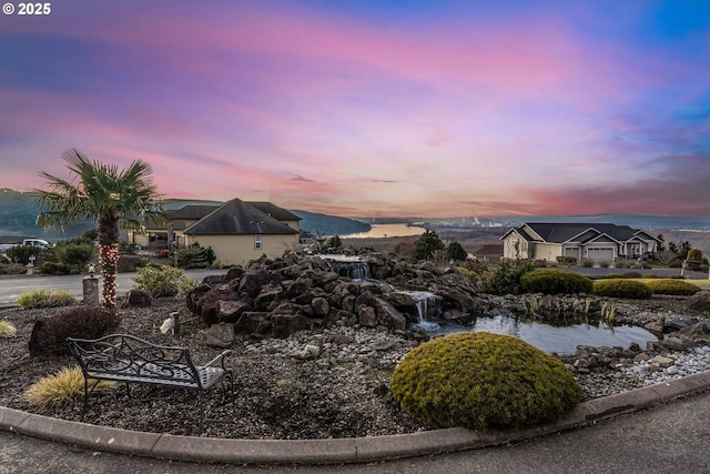 view of property's community with a water view