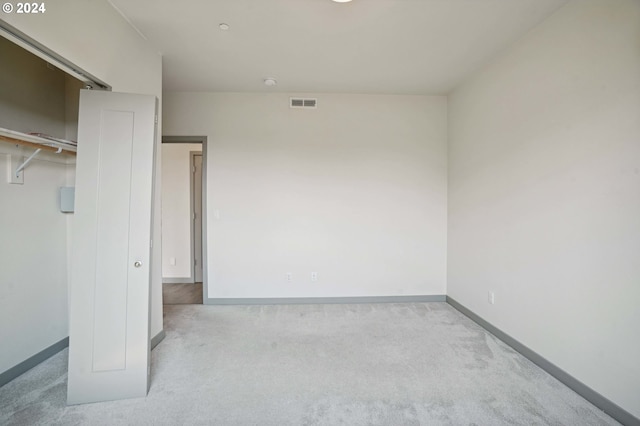 unfurnished bedroom featuring a closet