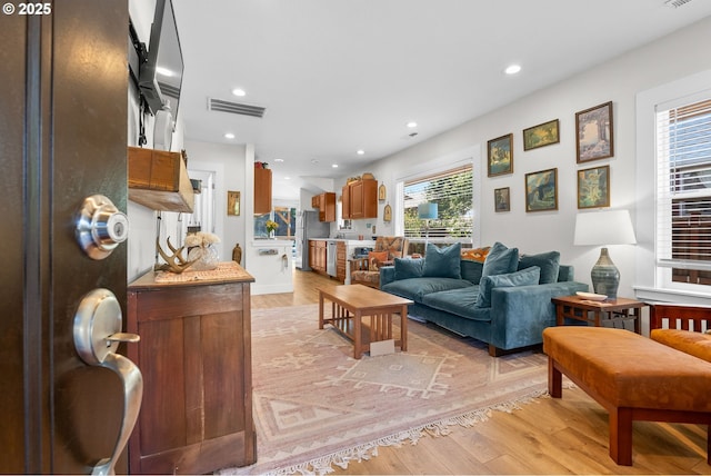 4604 SE 30th Ave, Portland, OR 97202 - living area featuring light wood-style flooring and recessed lighting