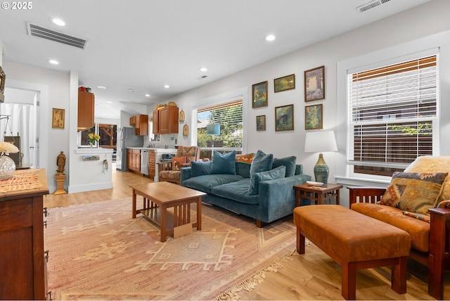 4604 SE 30th Ave, Portland, OR 97202 - living area featuring light wood-style floors and recessed lighting