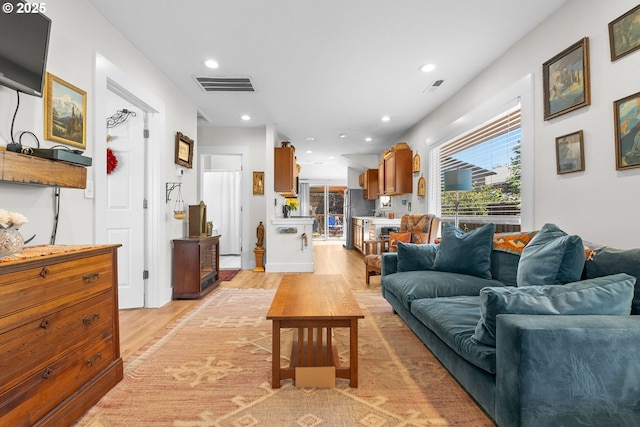4604 SE 30th Ave, Portland, OR 97202 - living room featuring light wood-style floors and recessed lighting