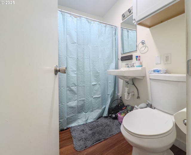 166 Iowa St, Eugene, OR 97402 - full bathroom with wood finished floors and a shower with shower curtain