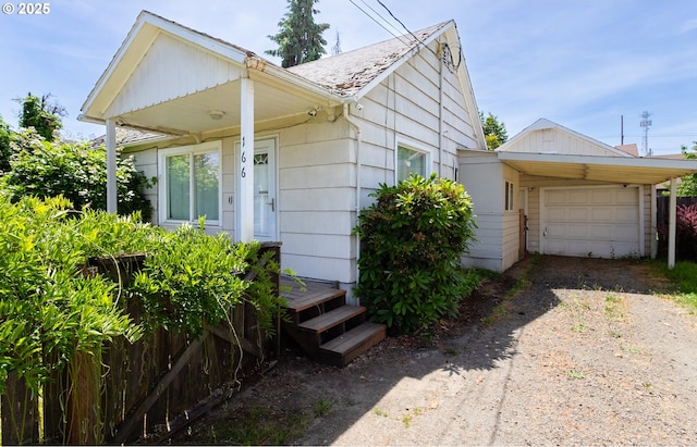 166 Iowa St, Eugene, OR 97402 - view of front of property with driveway, a garage, and a shingled roof