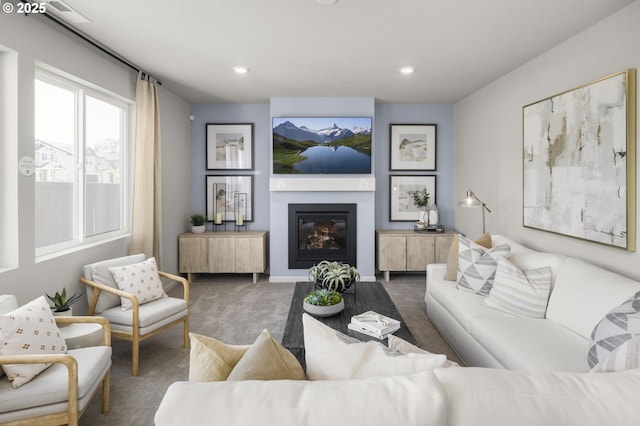 5603 Edward Ct SE, Albany, OR 97322 - carpeted living room with a glass covered fireplace and recessed lighting