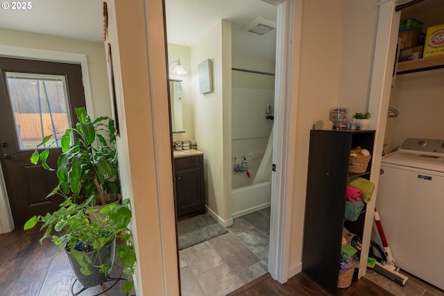 1727 E Washington Ave, Cottage Grove, OR 97424 - full bathroom with washer / clothes dryer, vanity, and tub / shower combination