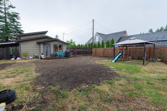 1727 E Washington Ave, Cottage Grove, OR 97424 - fenced backyard featuring a gazebo and a deck